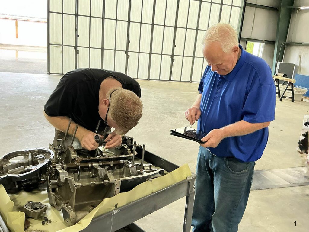 Rickey Gilmer and Hugh Carden wishing they were doing something else.