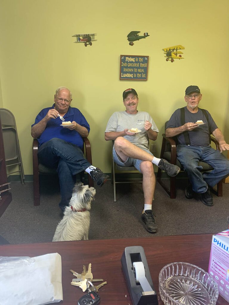 The Gilmer Aviation Staff and Airport Security Dog on Lunch Break